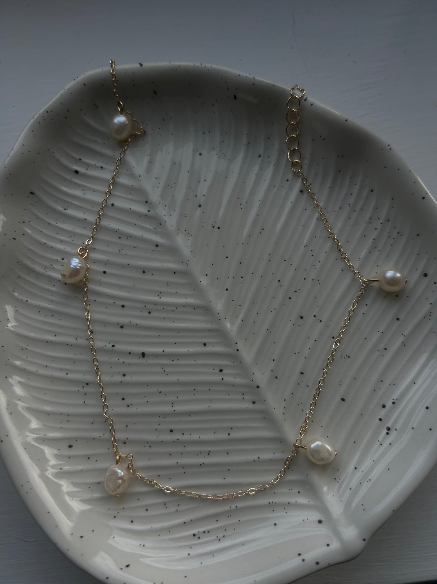 dropped pearl necklace