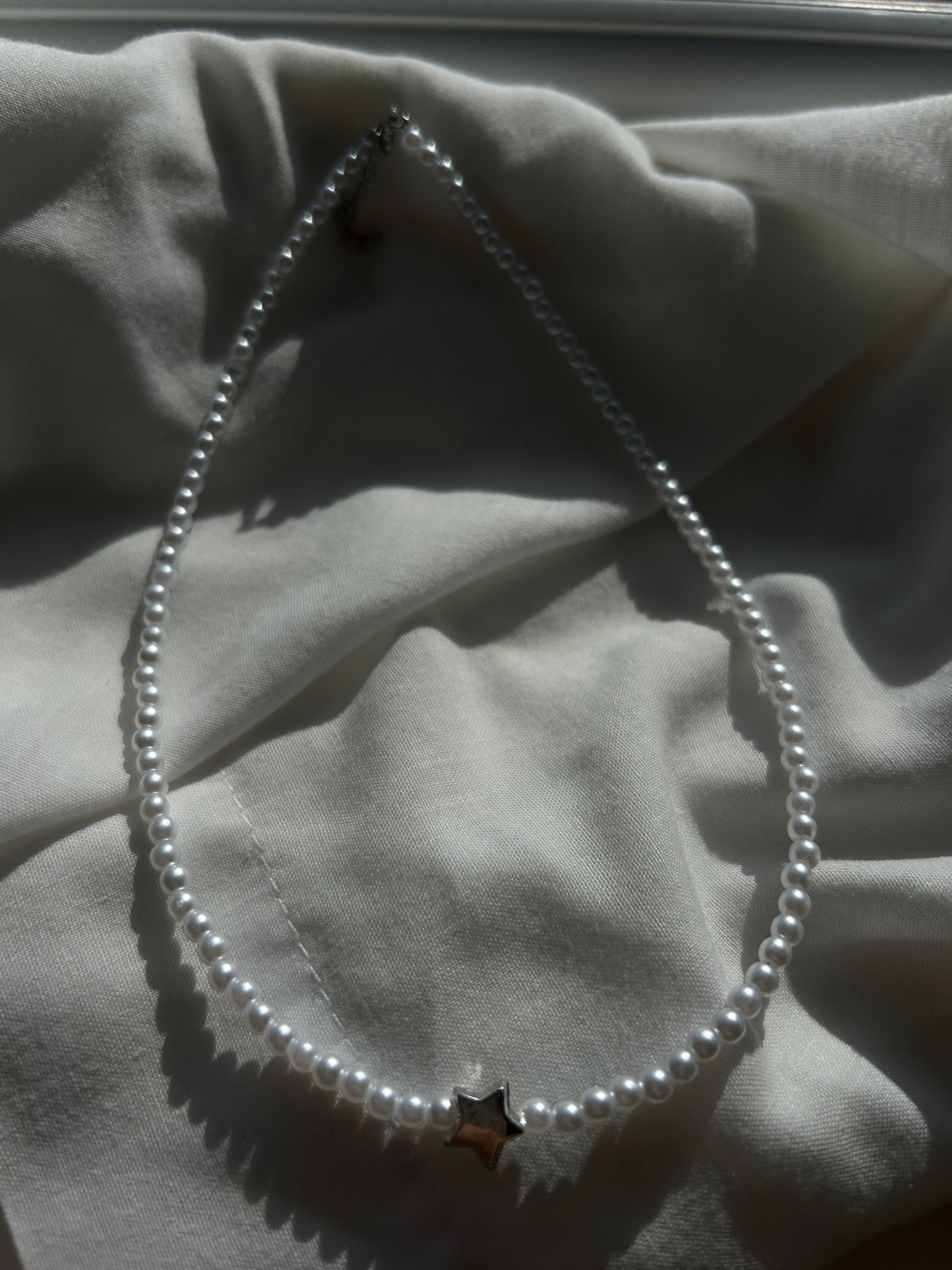 silver star pearl necklace