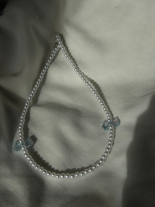 blue bow necklace