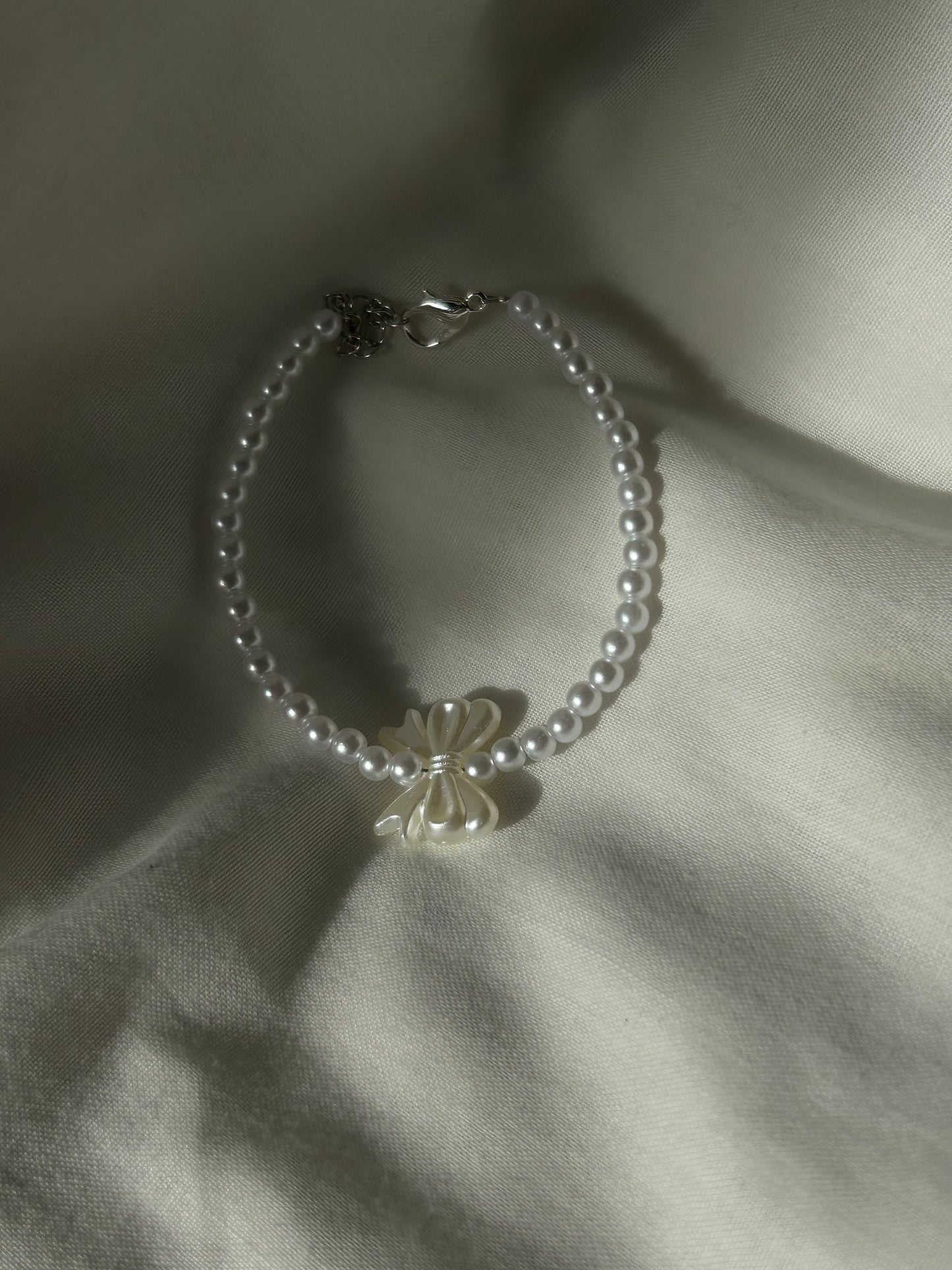 white bow bracelet