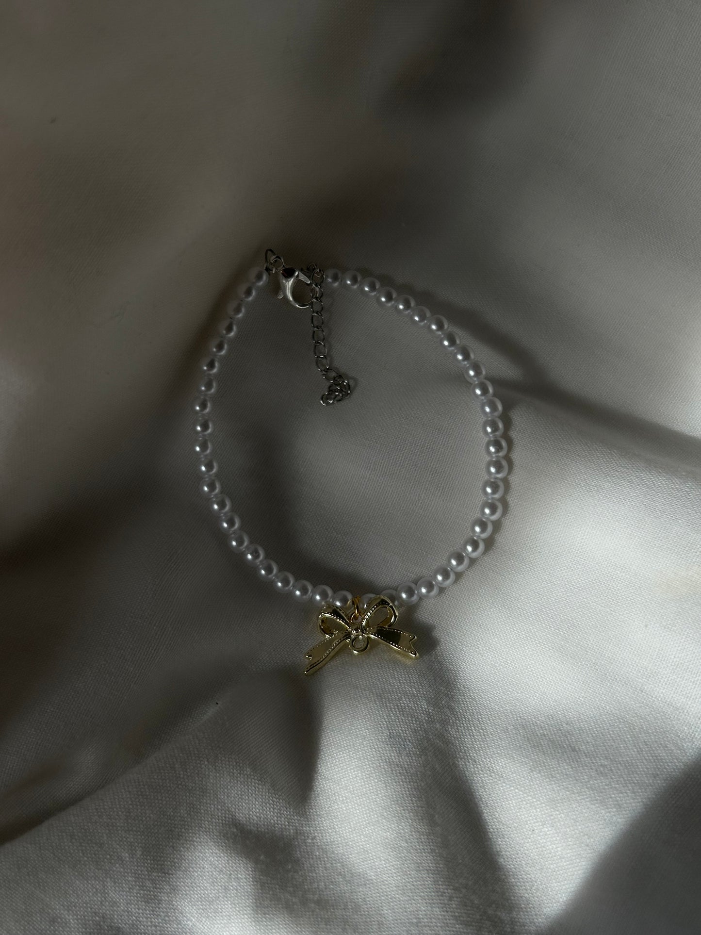 gold bow bracelet