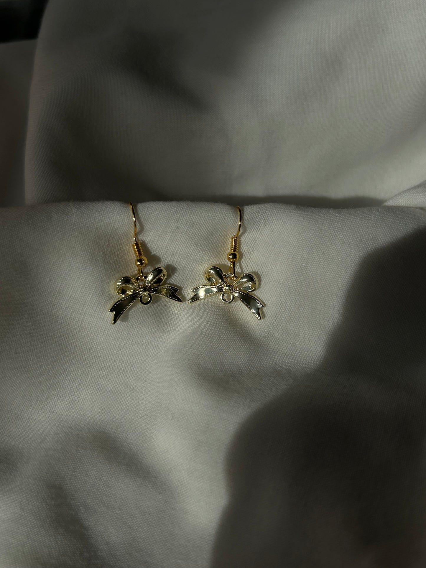 gold bow earrings