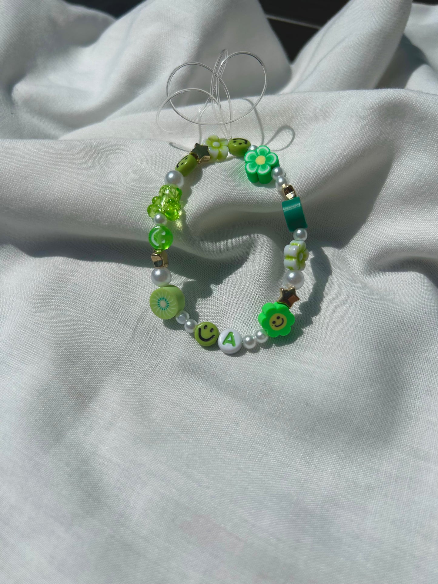 Green phone charm