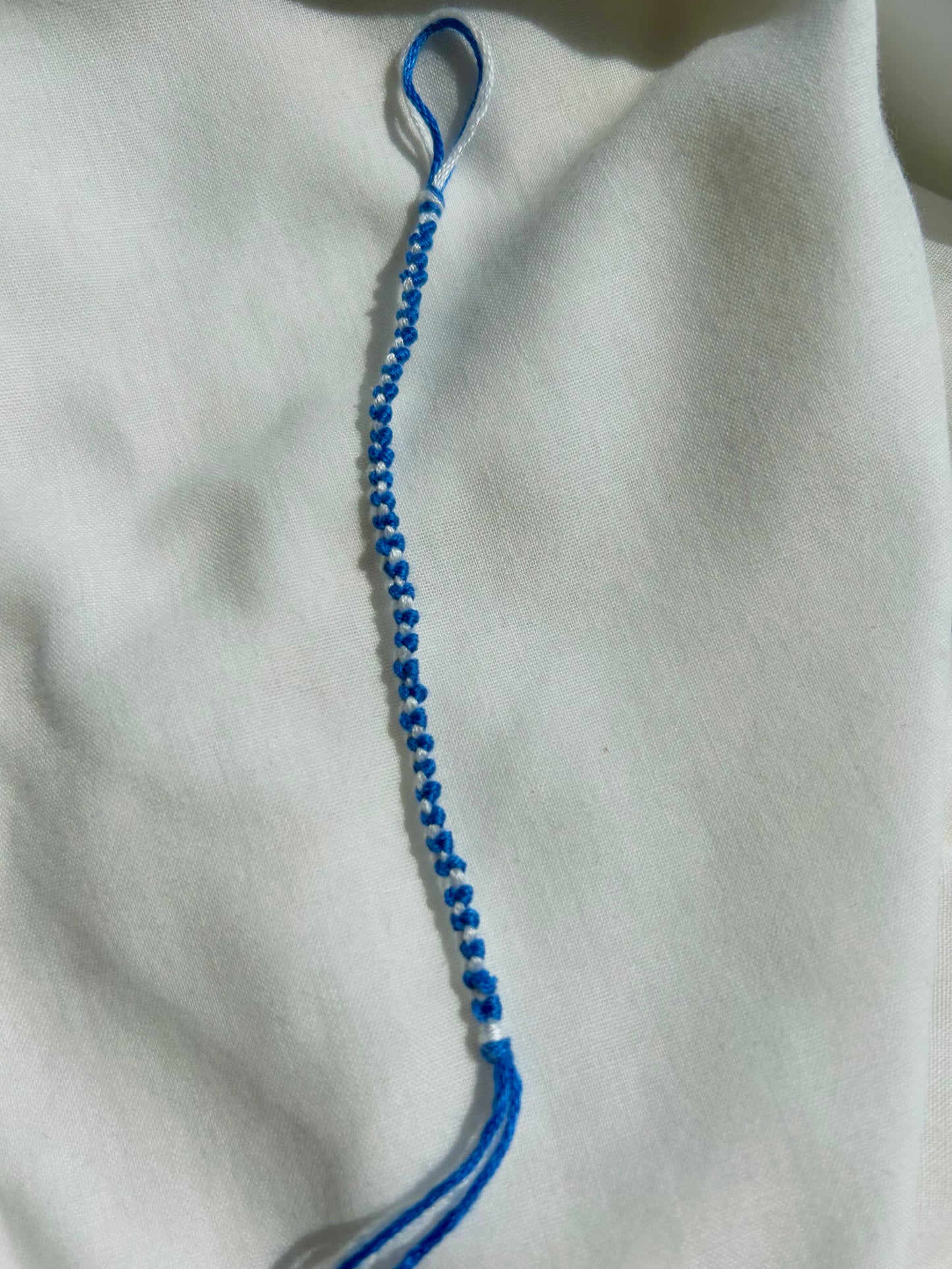 Blue and white embroidered bracelet