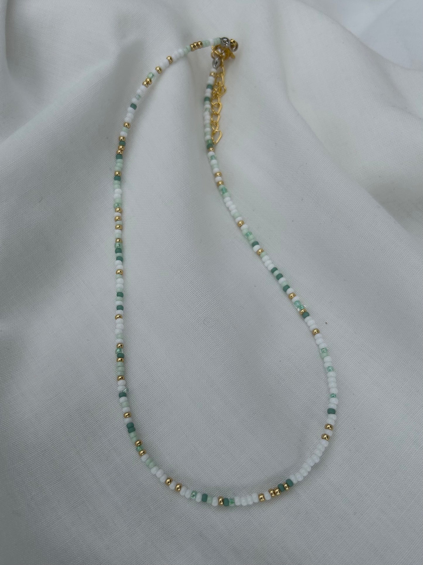 Gold and green beaded necklace