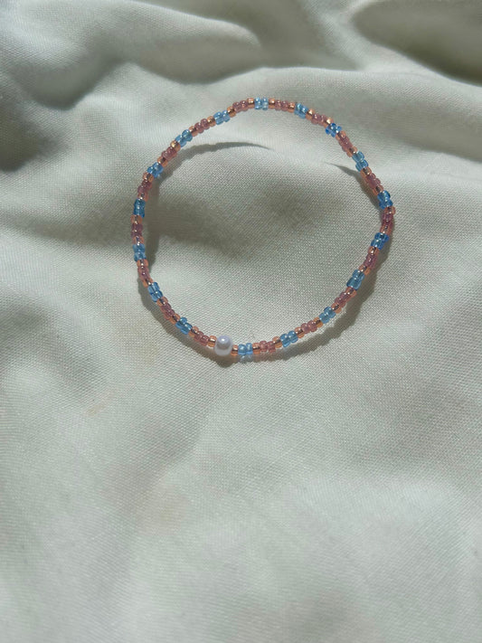 Pink and blue beaded bracelet