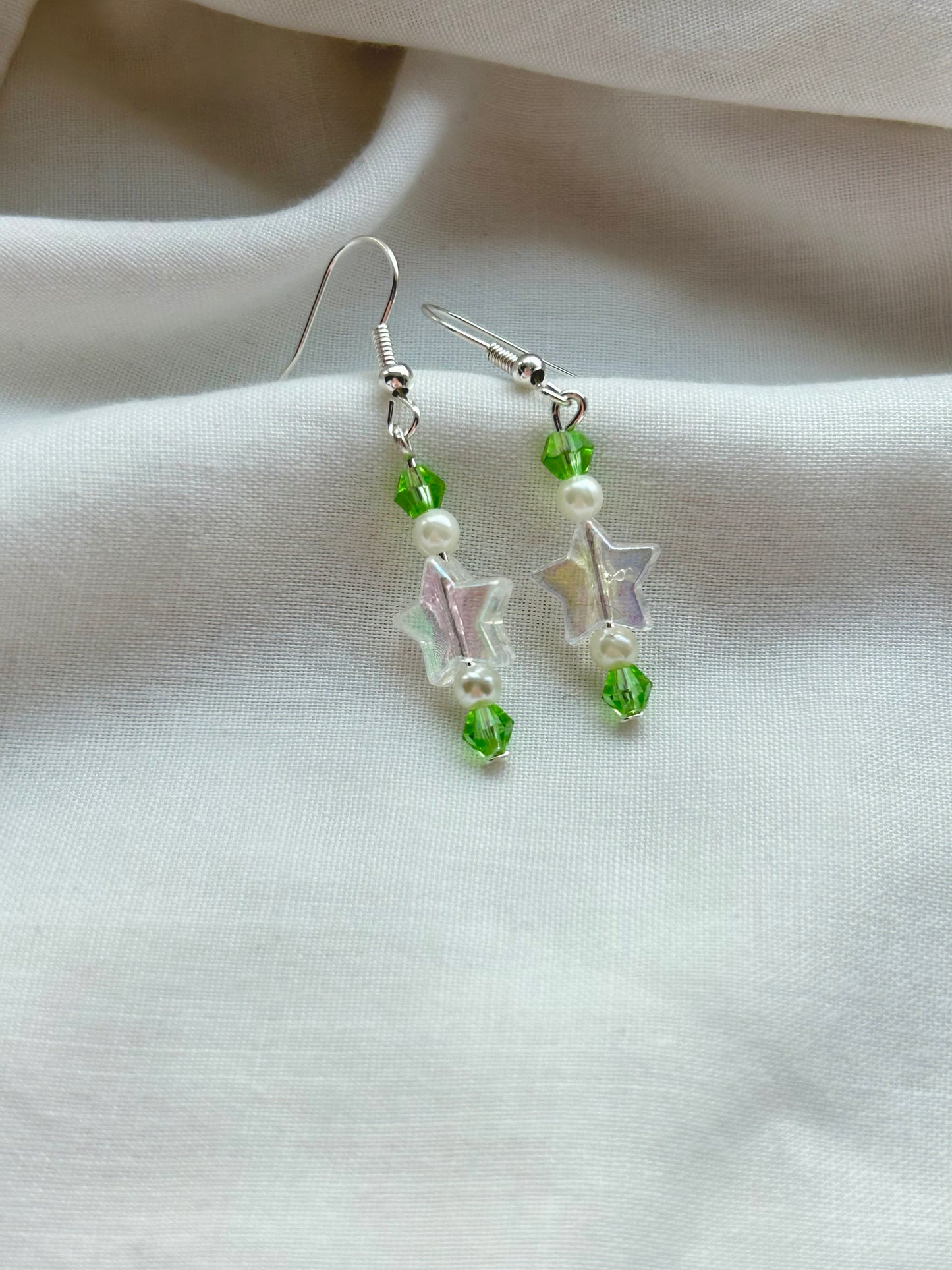 White and green star earrings