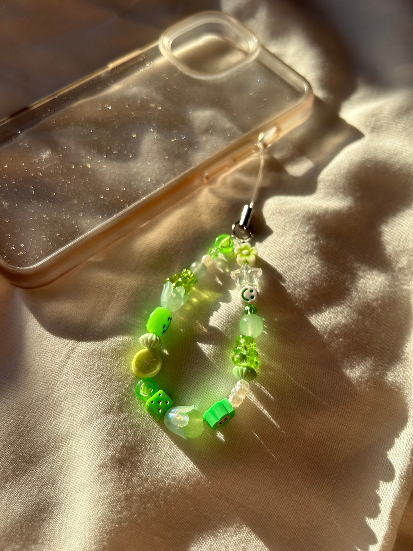 Green beaded phone charm