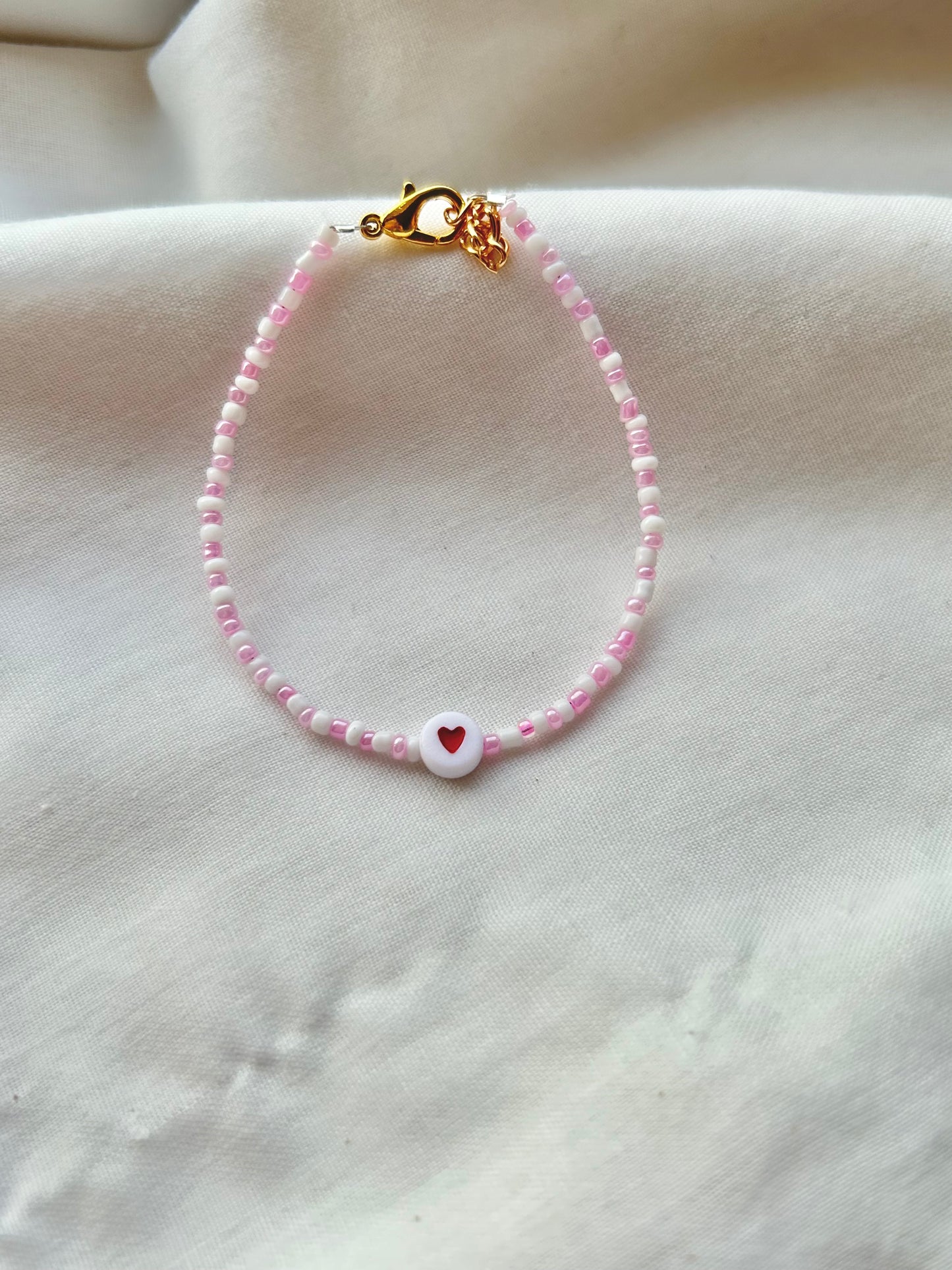 lovers💌 pink and white bracelet with heart charm