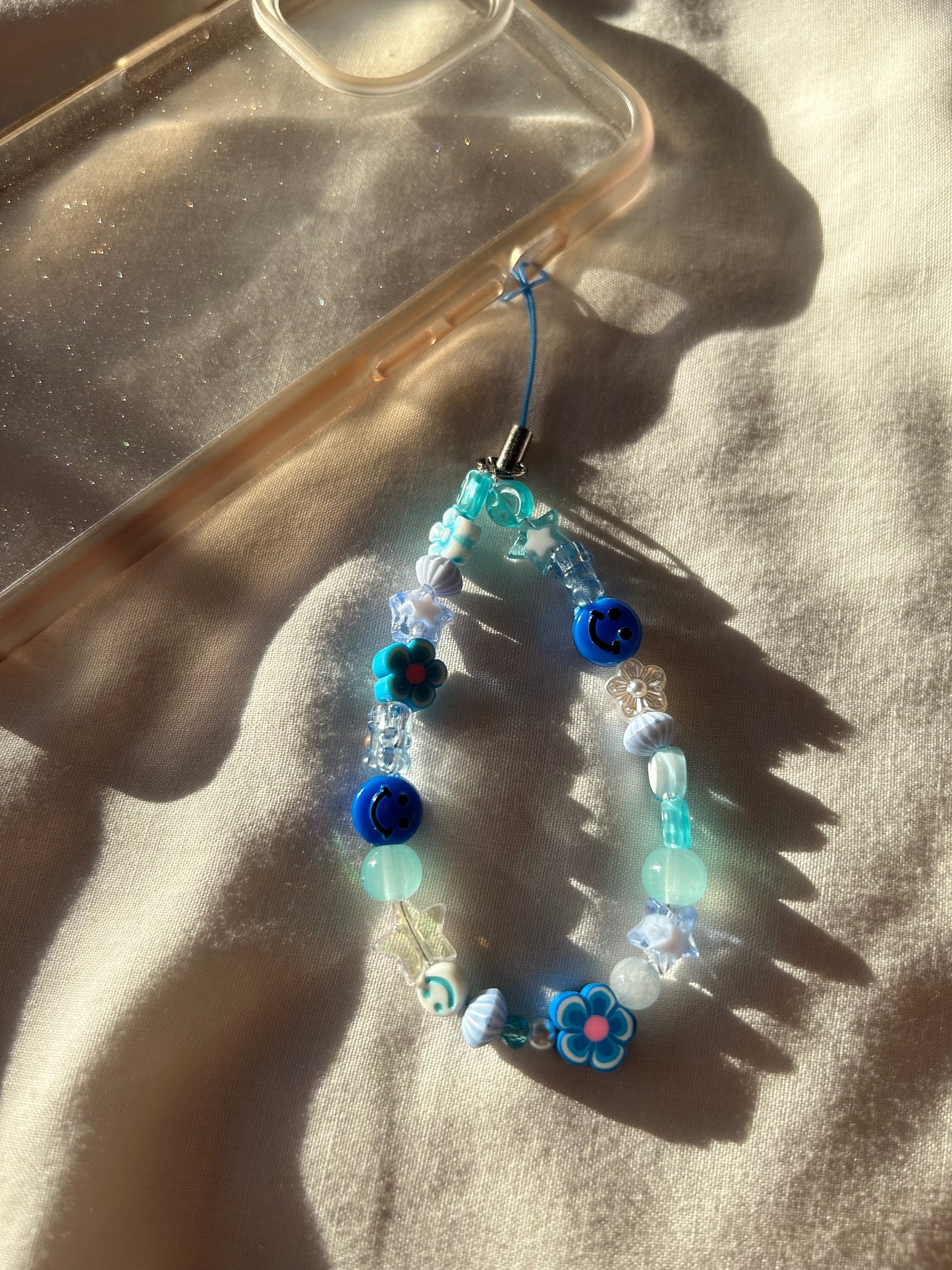 Blue beaded phone charm