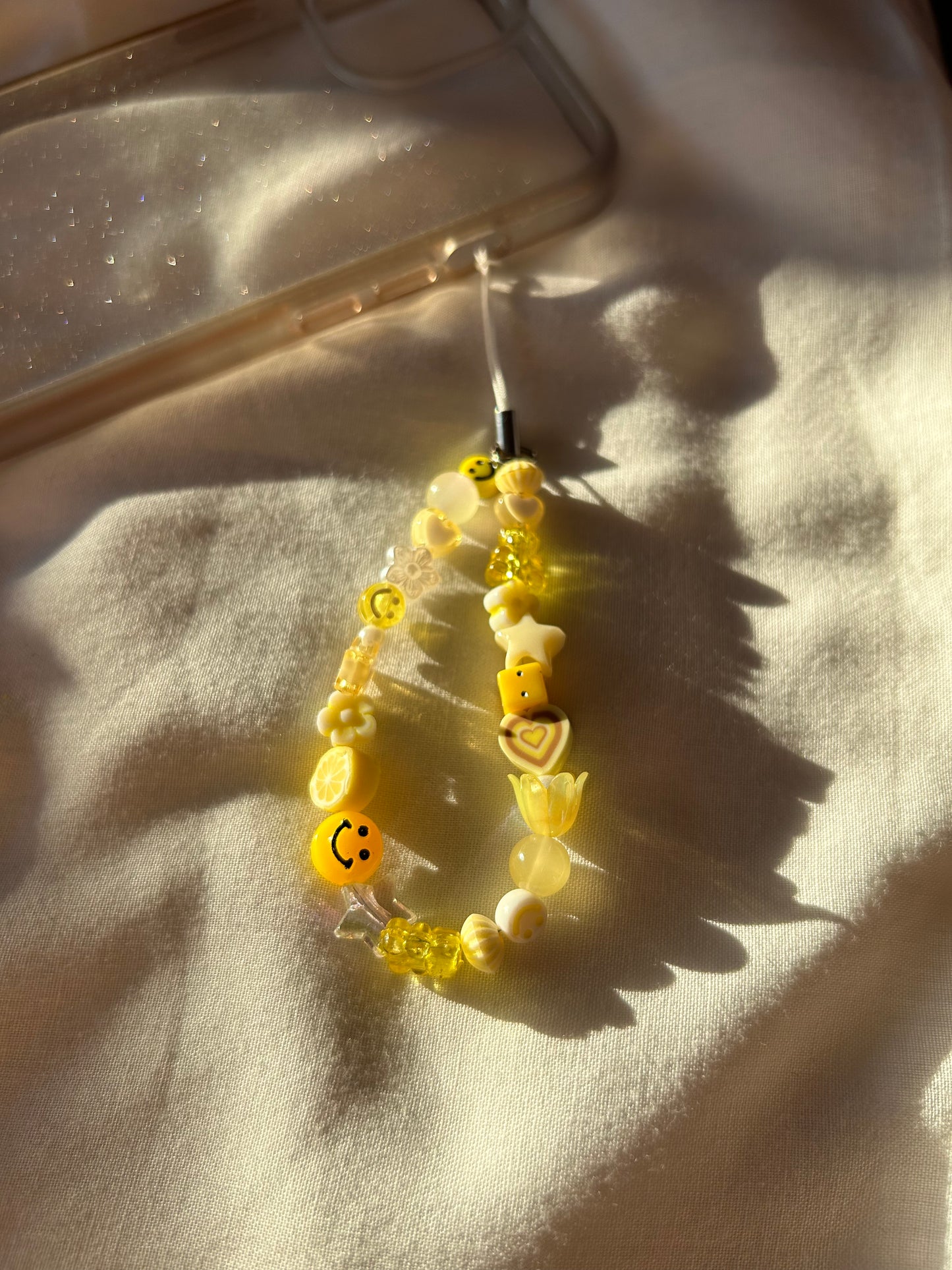 Yellow beaded phone charm