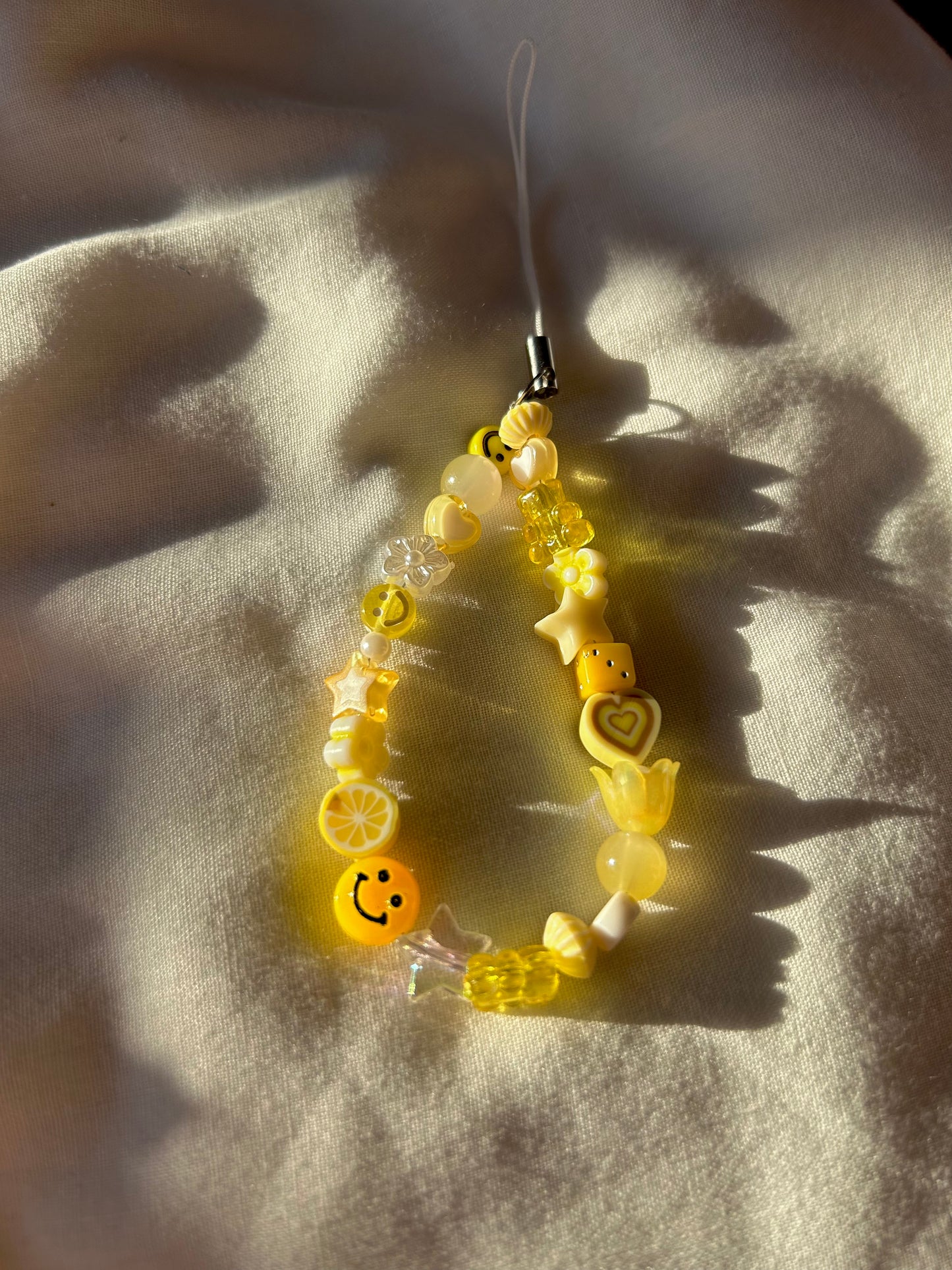 Yellow beaded phone charm